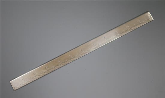 An Asprey & Co. silver ruler, London, 1936.